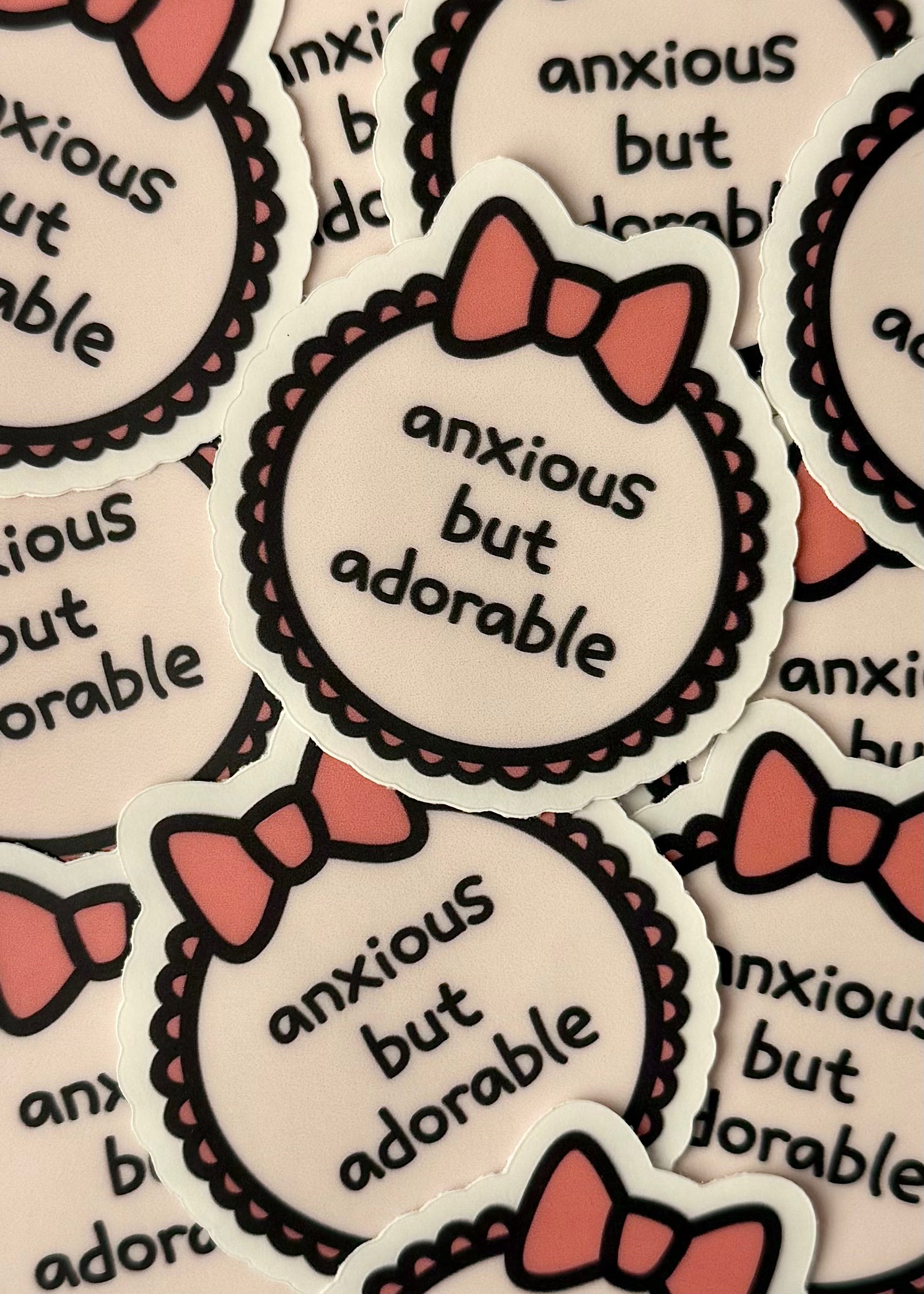 “anxious but adorable” bow sticker in pastel – relatable and cute vinyl sticker for decorating laptops, water bottles, and planners