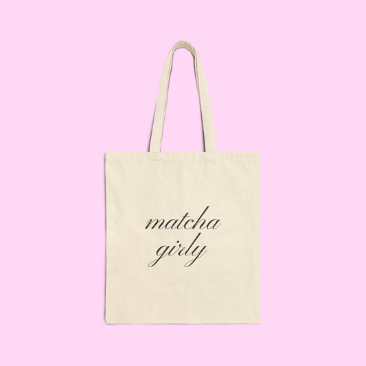 Aesthetic matcha girly canvas tote bag for matcha lovers. It says "matcha girly" in cursive black font. very chic, cute, and modern