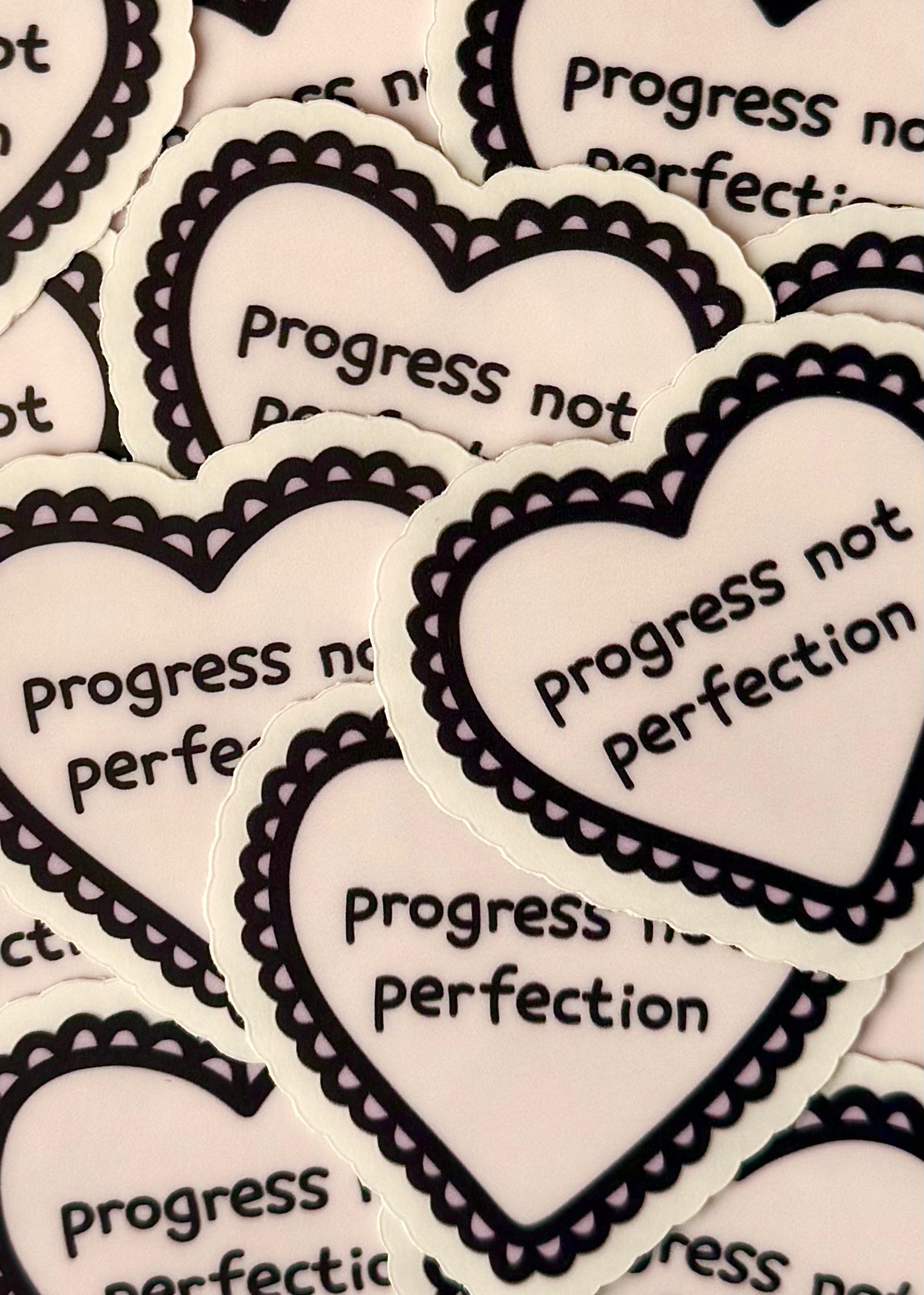 “progress not perfection” heart-shaped sticker – motivational vinyl sticker for self-growth and mental health, great for laptops, water bottles, and journals