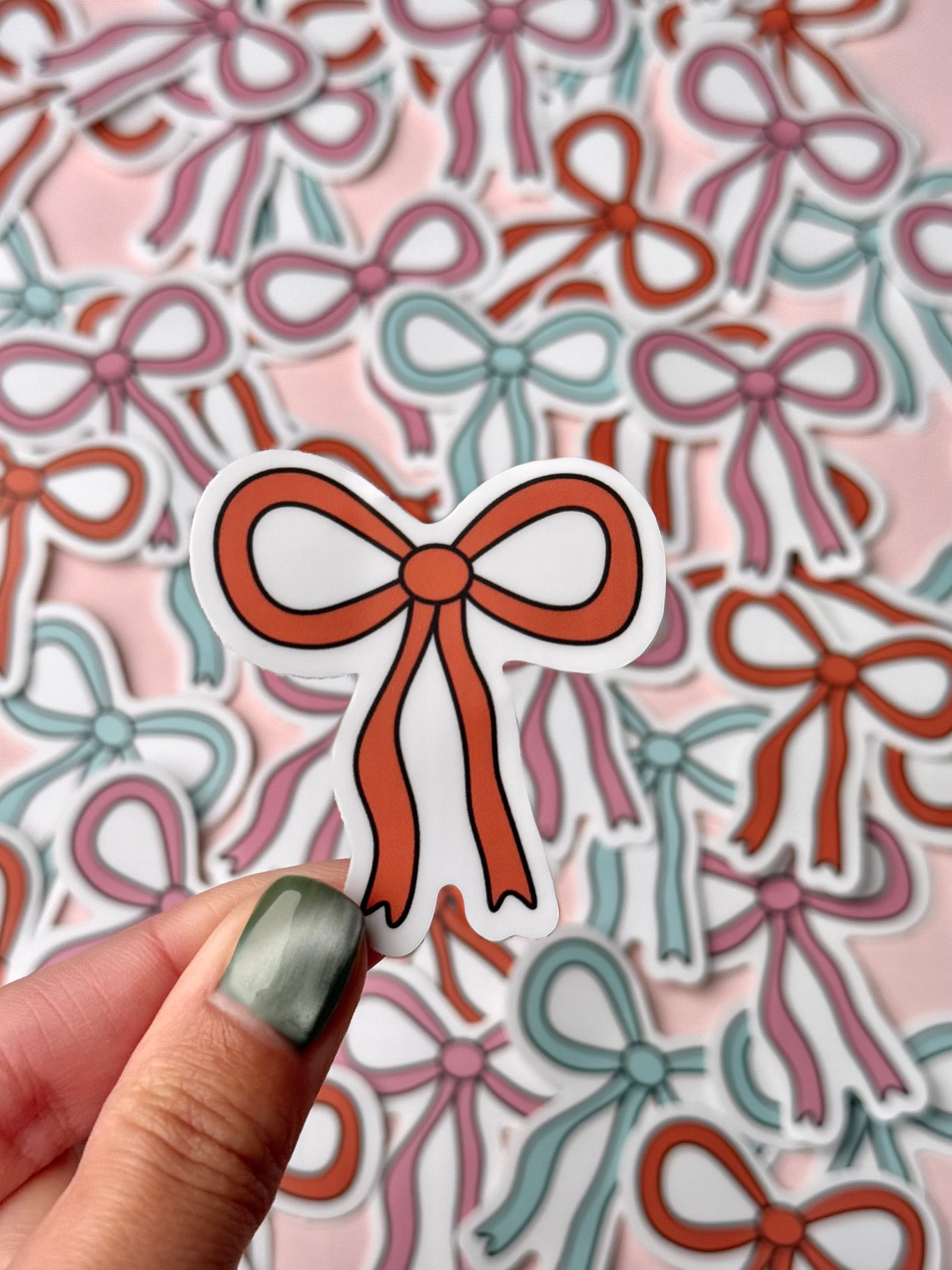 cute red bow vinyl sticker – aesthetic ribbon design for decorating laptops, water bottles, and planners