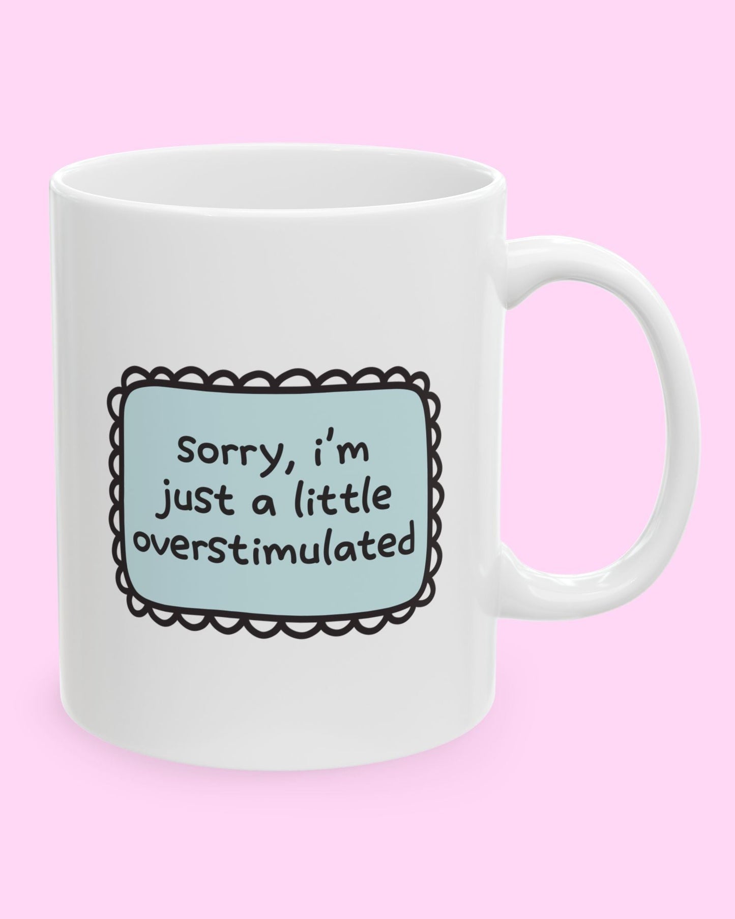 white ceramic mug with “sorry, i’m just a little overstimulated” text – mental health themed ceramic mug for coffee, tea, and self-care moments